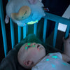 Lamb sound soother with star projection on baby