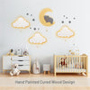 Hand painted cured wood design - LumiDreams cloud, elephant on moon, and star stickers on wall in nursery.