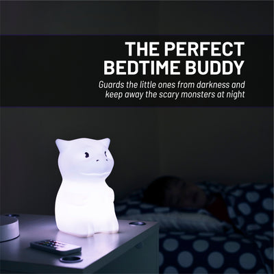 LumiDragon glowing white on end table with remote - The perfect bedtime buddy