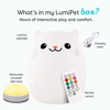 LumiCat nightlight with charging cable and remote control on a white background