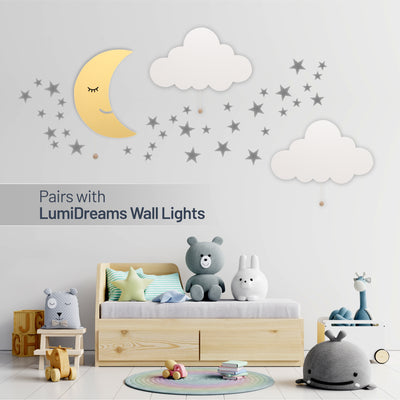 Pairs with LumiDreams wall lights - silver star stickers on wall with LumiDreams moon and cloud wall lights in children's bedroom.