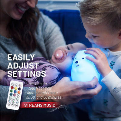 Easiliy adjust settings - 15, 30, and 60 minute sleep timer - Toddler, baby, and mother holding LumiBear nightlight with Bluetooth.