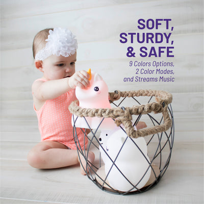 Soft, sturdy, and safe - 9 color options, two color modes, streams music - Child placing LumiUnicorn in basket.