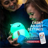 Easily adjust settings with 15, 30, or 60 minute sleep timer - Mother with child and LumiOwl with Bluetooth glowing green.