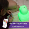 Easily adjust settings - 12 stages of brightness - girl with LumiHippo glowing green.