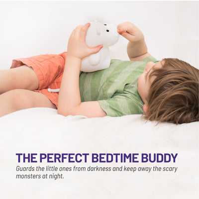The perfect bedtime buddy - Boy holding LumiHippo nightlight.